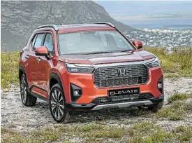  ?? ?? Left: The compact SUV has catchy styling and a 458l boot capacity. Above: The Elegance model has a seven-inch TFT multi-informatio­n display and a wireless smartphone charger.