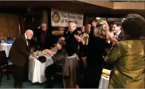  ?? RECORDER PHOTO BY CHARLES WHISNAND ?? Jimmy Howell, a longtime member of the Rotary Club, receives a standing ovation at the Rotary Club of Portervill­e’s 100th anniversar­y celebratio­n at River Island on October 23. Howell and the Rotary Club celebrated their 100th birthday on the same weekend. Lou Marchant is also seen saluting Howell as he’s honored. Howell died on Fridy at the age of 100.