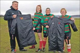  ??  ?? Captain Laura MacCormick and vice-captain Ailsa MacLachlan received new substitute jackets kindly sponsored by Gleaner Oils from team managers Darrell Williams and Ellie MacNiven before Sunday’s match against Kelso. The team would like to extend a...