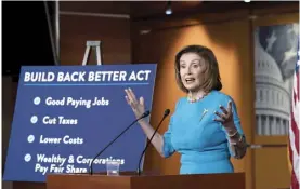  ?? AP photo ?? Speaker of the House Nancy Pelosi, D-Calif., talks to reporters about plans to pass President Joe Biden’s domestic agenda as the House meets to debate the Build Back Better Act, at the Capitol in Washington on Thursday.