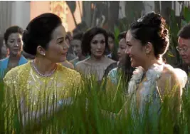  ??  ?? Kris Aquino as Princess Intan in a scene with Constance Wu; on left, Ken Jeong and Awkwafina