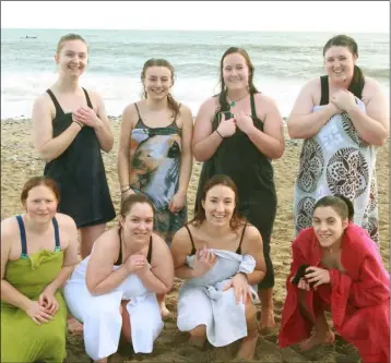  ??  ?? Volunteers after their swim, front row: Gale Loescher, Aurelie Garnier, Rikki Johnston and Sara Alanso. Back row: Emily Cokl, Mary Mahon, Sidney Syone and Mary Kate Bolger.