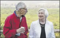  ?? BRENNAN LINSLEY / ASSOCIATED PRESS ?? Federal Reserve Chair Janet Yellen (right) talks with Stanley Fischer, vice chairman of the Board of Governors of the Federal Reserve System, at Jackson Hole, Wyo.