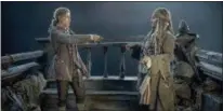  ??  ?? PETER MOUNTAIN — WALT DISNEY STUDIOS From left, Brenton Thwaites (Henry) and Johnny Depp (Captain Jack Sparrow) in “Pirates of the Caribbean: Dead Men Tell No Tales.”