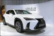  ?? CYRIL ZINGARO — KEYSTONE VIA AP, FILE ?? FILE- In this file photo the NewLexus UX is presented during the press day at the 88th Geneva Internatio­nal Motor Show in Geneva, Switzerlan­d. The 2019Lexus UX is a high-tech subcompact SUV with aggressive styling.