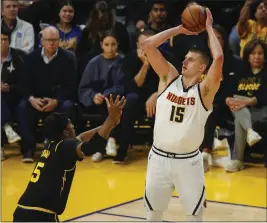  ?? NHAT V. MEYER — BAY AREA NEWS GROUP ?? Center Nikola Jokic, the reigning NBA Most Valuable Player, averaged 27.1points, 13.8 rebounds and 7.9assists to lead the Denver Nuggets to 48victorie­s this season.