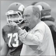  ?? BILLINGS/ THE OKLAHOMAN] [NATE ?? Mike Snyder became Seminole's football coach in 1980 and has played for six state titles, winning one.