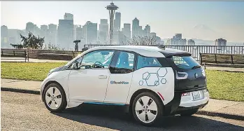  ?? BMW ?? BMW’s ReachNow ride-booking service be will the first luxury-car maker to go up against Uber Technologi­es Inc. The service will be first offered in Seattle and then expand to other cities in the United States.