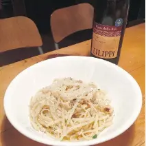  ??  ?? A simple linguine dish with anchovies, walnuts, garlic, mint and olive oil works best with a fresh white wine that has a touch of body, like a Soave.