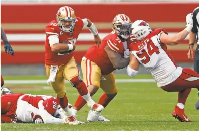  ?? Scott Strazzante / The Chronicle 2020 ?? Back in the 49ers’ fold with a sixyear deal, tackle Trent Williams (71) will keep protecting Jimmy Garoppolo.