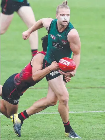  ?? Picture: MICHAEL KLEIN ?? STAR FACTOR: Essendon hopes players like recruit Jake Stringer will drive the club back towards the top four this season. INSET: Xavier Campbell.