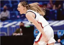  ?? Getty Images file photo ?? UConn’s Paige Bueckers reacts during the NCAA Women’s Basketball Tournament in 2021. What other record breakers will play here when the women’s Final Four returns in 2029?