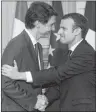  ?? CP PHOTO ?? Prime Minister Justin Trudeau, left, shakes hands with French President Emmanuel Macron as they hold a joint press conference at the Palais de l’Elysee in Paris, France, on Monday.