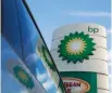  ?? — Reuters ?? A BP logo is reflected in a car window at a petrol station in central London.