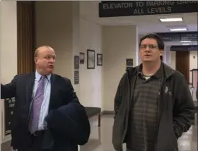  ?? CARL HESSLER JR. — MEDIANEWS GROUP ?? Robert Andrew Domarasky, 48, (on right) leaves Montgomery County courtroom with his lawyer Eugene Tinari after he admitted stealing from a charity assisting the family of a county deputy sheriff whose children died in a Dec. 13, 2017, fire at their Schwenksvi­lle home.