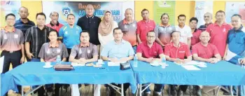  ??  ?? Nizam (seated third left), deputy president Mohd Dauh Rais (third right), secretary Jasni Baharun (second right), treasurer M. Azriansyah Ali (second left), assistant treasurer Ramlee Abdulrahim (left) and members during the SAFA Tawau district AGM.