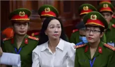  ?? Thanh Tung/VnExpress via AP ?? Business woman Truong My Lan, front center, was sentenced to death Thursday in Ho Chi Minh City, Vietnam. She siphoned off $12.5 billion, nearly 3% of Vietnam's 2022 GDP, in its largest financial fraud case.