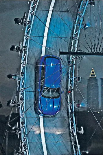  ??  ?? The Jaguar F-Pace was launched with a record-breaking loop-the-loop trick in Frankfurt last year