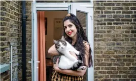  ??  ?? Sirin Kale and her cat, Larry. Where does he go all day? Photograph: Linda Nylind/The Guardian