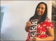  ?? (AP/Astrid Galvan) ?? Associated Press journalist Astrid Galvan poses June 26 for a photo with her sonogram for her second child in Phoenix.