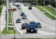  ?? FILE PHOTO ?? The low bid widening of County Line Road near Miami Valley Research Park came in at $2.55 million, well below Kettering’s $3.1 million estimate.