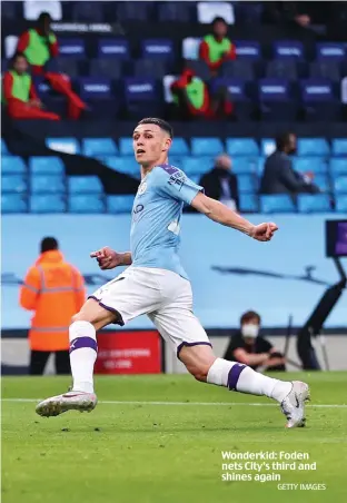  ?? GETTY IMAGES ?? Wonderkid: Foden nets City’s third and shines again