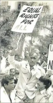  ??  ?? Sewpersadh being carried shoulder-high after he was released from detention.