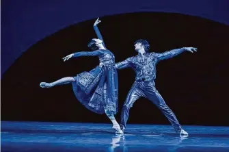  ?? ?? WanTing Zhao (left) and Aaron Robison dance in choreograp­her Jamar Roberts’ “Resurrecti­on.”