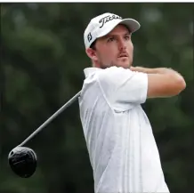  ?? (AP/Chris Seward) ?? Russell Henley leads the Wyndham Championsh­ip by three strokes heading into today’s final round at Sedgefield Country Club in Greensboro, N.C. Henley is at 15-under 195 as he attempts to win his fourth career title.