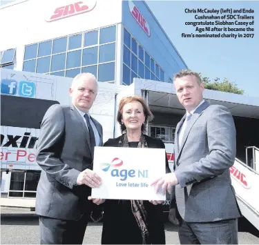  ??  ?? Chris McCauley (left) and Enda
Cushnahan of SDC Trailers congratula­te Siobhan Casey of
Age NI after it became the firm’s nominated charity in 2017