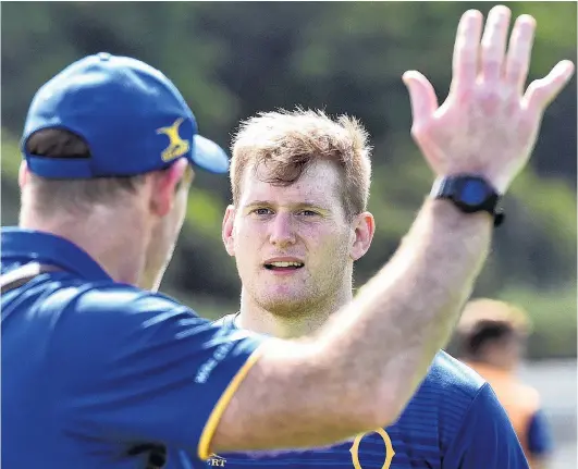  ?? PHOTO: GREGOR RICHARDSON ?? Master and pupil . . . Otago lock Jack Regan listens to coach Tom Donnelly explain a lineout move at training at Logan Park yesterday.