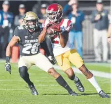  ?? Cliff Grassmick, Daily Camera ?? CU cornerback Isaiah Oliver, defending against USC’s Tyler Vaughns, should be healthy vs. Utah.