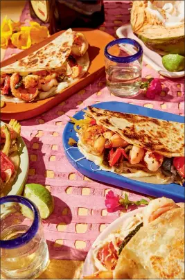  ?? PHOTO BY REN FULLER ?? Martínez visited all 32states in Mexico while researchin­g “Mi Cocina,” which gathers 100-plus recipes from seven regions, including for these Tacos Gobernador.