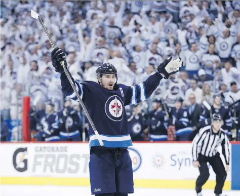 ?? JOHN WOODS/THE CANADIAN PRESS ?? Mark Scheifele and the Jets will look to take advantage of another wild whiteout Friday during Game 2 in Winnipeg.