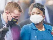  ?? KESTERSON/AP LAURENCE ?? Pennsylvan­ia House Minority Leader Joanna McClinton, right, noted during a recent session that “Masks are supposed to be worn on the floor of the House, and I’ve counted over 30 members that currently are unmasked.”