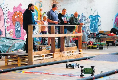  ?? Photo / Lewis Gardner ?? The Wanganui Radio Control Car Club created a track inside the Bedford Ave Studio and held their first-ever race day there on Saturday.