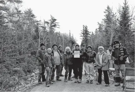  ??  ?? Members of Extinction Rebellion were served an interim injunction Friday by the Nova Scotia Supreme Court against blocking access roads to logging operations run by Westfor.