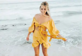  ?? BRIT GILL ?? Vancouver-based influencer Cara Jourdan is pictured in Tulum wearing a linen set from Posse.