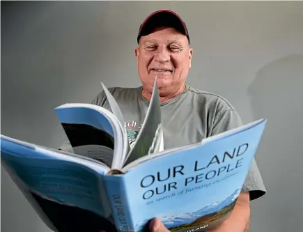  ?? ROBYN EDIE/STUFF ?? Ross Hyland with the his book Our Land Our People, which he has written, and taken the photograph­s for, tells stories about farming around New Zealand.