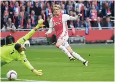  ?? — Reuters ?? Ajax’s Kasper Dolberg scores their second goal.