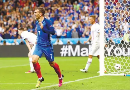  ?? (AP FOTO) ?? QUICK START. Olivier Giroud celebrates an early goal as France takes a 4-0 lead in the first half against Iceland in their European Championsh­ips quarterfin­al match.