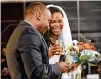  ?? D’MARCUS PULSE / TURNER STUDIOS ?? Destinee Clavon and Anthony Baker exchange vows at Turner Studios, where they both work.