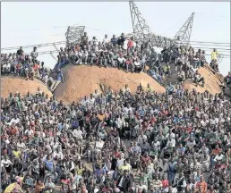  ?? PICTURE: MATTHEWS BALOYI/ANA PICTURES ?? Crosses were placed on the hill near Marikana in memory of the miners who died during the violence. Six years on, the people of Marikana and surroundin­g areas will converge on the infamous koppie in the mining community outside Rustenburg, where 34 striking miners were shot.