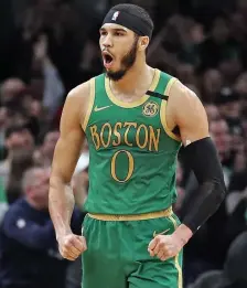  ??  ?? SHOWING ENTHUSIASM: Celtics All-Star forward Jayson Tatum screams out in celebratio­n during a game against the L.A. Clippers at the TD Garden on Feb. 13,