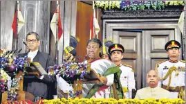  ?? ANI ?? Chief Justice of India NV Ramana administer­s the oath of office to President Droupadi Murmu at the Central Hall of the Parliament in New Delhi on Monday.