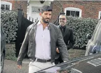  ?? Picture: GC IMAGES ?? CHANGED STORY: Celebrity hair stylist Fadi Fawaz, front, and George Michael seen in London in 2012
