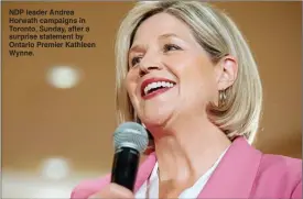  ??  ?? NDP leader Andrea Horwath campaigns in Toronto, Sunday, after a surprise statement by Ontario Premier Kathleen Wynne.