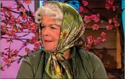  ?? ?? HORSEPLAY: Linda Robson wearing a headscarf as the Queen does