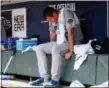  ?? JOHN BAZEMORE — ASSOCIATED PRESS ?? Mets relief pitcher Seth Lugo sits on the bench after allowing the tying run in the eighth inning of the opening game of Monday’s doublehead­er at Atlanta.