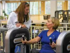  ?? SUBMITED PHOTO — ACAC FITNESS & WELLNESS CENTER ?? A nurse is working with an acac member during a session at the fitness club. The wellness center offers a Physician Referred Exercise Program to help jump start patients with a fitness routine.